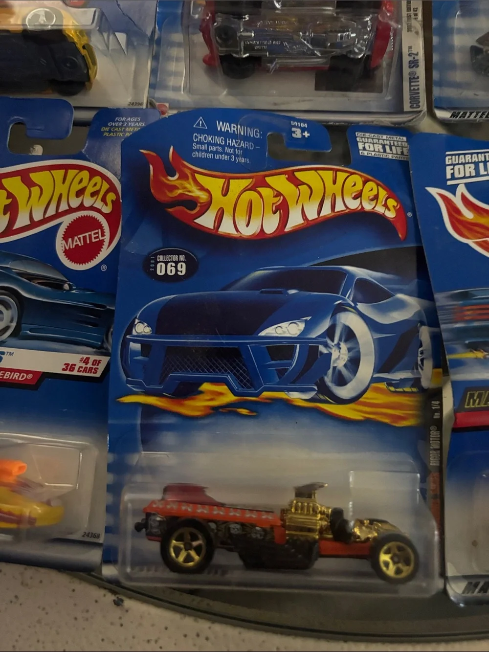 10 Hot Wheels cars in packaging